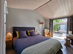 Maisons d'hotes Derriere la plage : suite, patio et pergola : photos des chambres