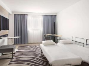 Hotels Novotel Paris Charles de Gaulle Airport : photos des chambres