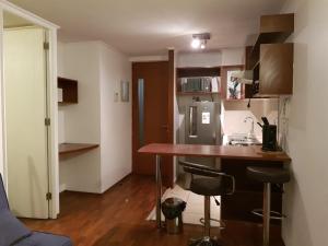 Carmen con Argomedo, PARKING por pagar