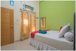 RedDoorz near Lapangan Tenis Balikpapan