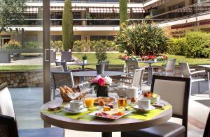 Hotels The Originals Boutique, Hotel Les Strelitzias : photos des chambres
