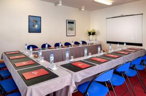 Hotels The Originals Boutique, Hotel Les Strelitzias : photos des chambres