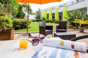 Hotels Comfort Aparthotel Saint-Nazaire Les Portes de l Ocean : photos des chambres
