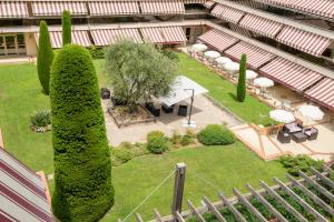 Hotels The Originals Boutique, Hotel Les Strelitzias : photos des chambres