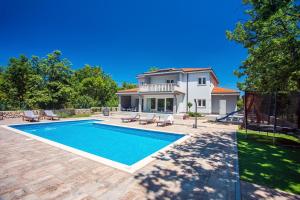 Villa Andrea with 5 bedrooms, 50 sqm private pool, a fun zone with PRO 9 Pool table, outdoor playgro 