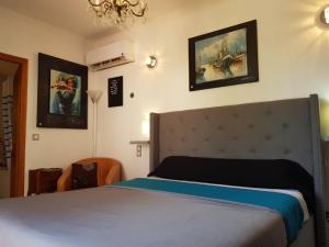 Maisons de vacances SUITE-Junior -Villa HELENE - Montpellier Sud - aeroport- PISCINE Privee-2mn des plages : photos des chambres