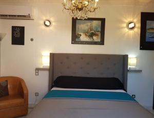 Maisons de vacances SUITE-Junior -Villa HELENE - Montpellier Sud - aeroport- PISCINE Privee-2mn des plages : photos des chambres