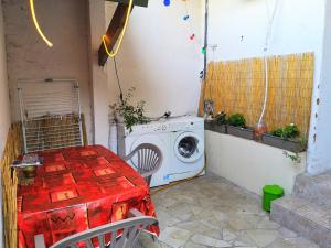 Maisons d'hotes Mini Studio de 13 m2 avec terrasse 15 mn centre Nimes : photos des chambres