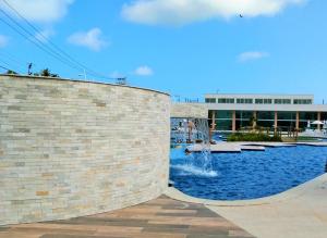 FLAT MURO ALTO CONDOMÍNIO CLUBE