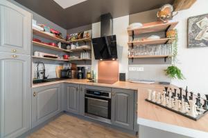 Maisons de vacances Logement artiste entier centre village : photos des chambres