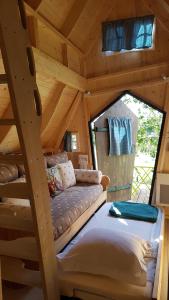 Chalets Les CASAS La Champreniere : photos des chambres