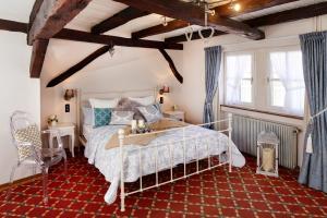 Maisons d'hotes Historisches Gastehaus Au Faucon : photos des chambres