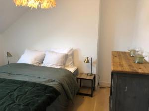 Appartements Charme en centre ville, tout equipe, local velos : photos des chambres