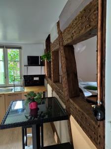 Appartements La Grande Terrine - Gites Les Potiers : photos des chambres