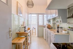 Renovated Sunny Apartment with Amazing Sunset Balcony , By TimeCooler