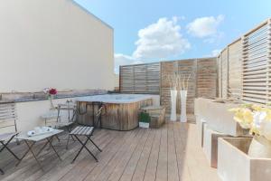 Appartements PEACE&LOFT: JACUZZI & TERRASSE : photos des chambres