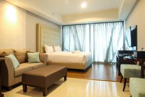 Elegant 1BR Kemang Village Apartment By Travelio