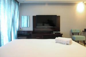 Elegant 1BR Kemang Village Apartment By Travelio