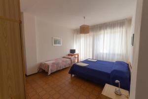 Camera Comunicante con Balcone e Vista Mare