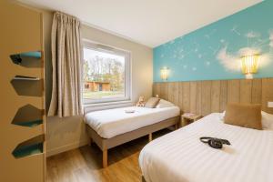 Villages vacances Center Parcs Le Bois aux Daims : photos des chambres