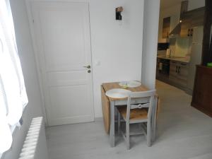 Appartements L IMPREVU : photos des chambres