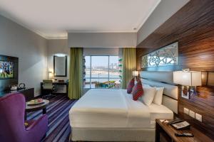 Deluxe King Room room in Ghaya Grand Hotel & Apartments
