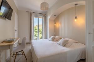 Hotels Les Jardins Du Cedre : photos des chambres