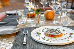Hotels Les Jardins Du Cedre : photos des chambres