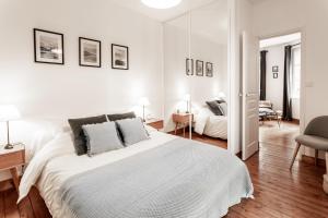 Appartements Au Coeur De La Ville : photos des chambres