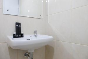 Homey Studio at Springlake Summarecon Bekasi Apartment By Travelio