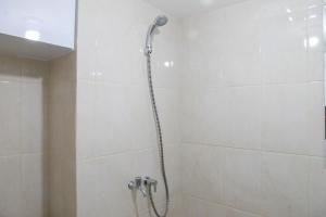 Homey Studio at Springlake Summarecon Bekasi Apartment By Travelio