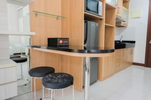 Affordable Price Studio Apartment at Scientia Residence By Travelio