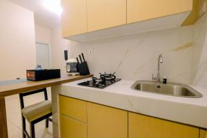 Fully Furnished 2BR at Teluk Intan Apartment By Travelio
