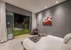 Palms Edge Villas avec Piscine & Jardin Privés