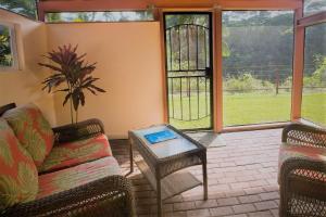 Junior Suite with Screened Lanai room in The Inn at Kulaniapia Falls