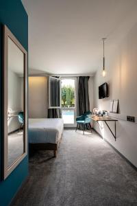 Hotels PoMo Hotel & Restaurant : Chambre Lit King-Size