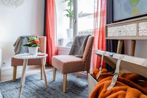 Appartements Studio centre ville avec parking : photos des chambres