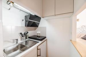 Appartements Studio centre ville avec parking : photos des chambres