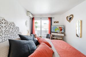 Appartements Studio centre ville avec parking : photos des chambres