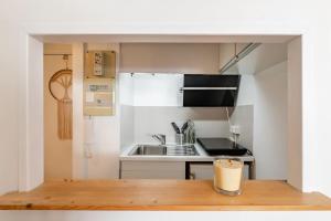 Appartements Studio centre ville avec parking : photos des chambres