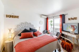 Appartements Studio centre ville avec parking : photos des chambres