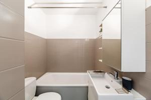 Appartements Studio centre ville avec parking : photos des chambres