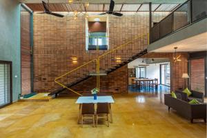 SaffronStays Riverstone 3-BR Riverside Villa with Farm Views