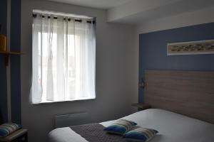 Hotels LOGIS Hotel Restaurant Auberge Du Cheval Blanc : photos des chambres