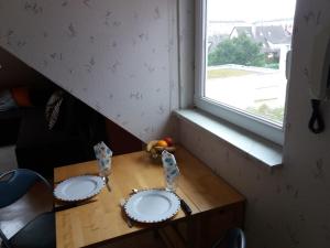 Appartements Logis 18 Rose : photos des chambres