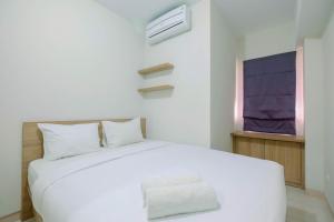 Simply and Cozy 2BR at Springlake Summarecon Bekasi Apartment By Travelio