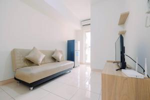 Simply and Cozy 2BR at Springlake Summarecon Bekasi Apartment By Travelio