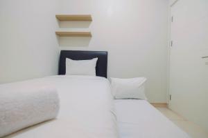 Simply and Cozy 2BR at Springlake Summarecon Bekasi Apartment By Travelio