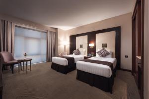 Classic Twin Room with City or Patio View  room in Rua Al Hijrah Hotel
