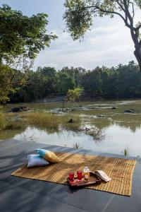 SaffronStays Riverstone 3-BR Riverside Villa with Farm Views